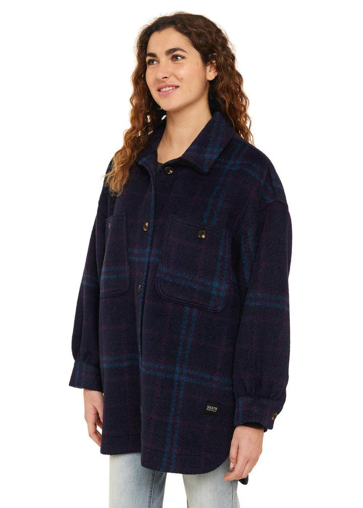 Side view of Sisstr Misha Overshirt highlighting navy plaid pattern and oversized style.