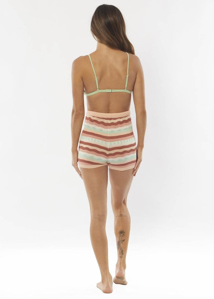 Sisstrevolution Empty Room Knit Short in rust with striped design, back view.