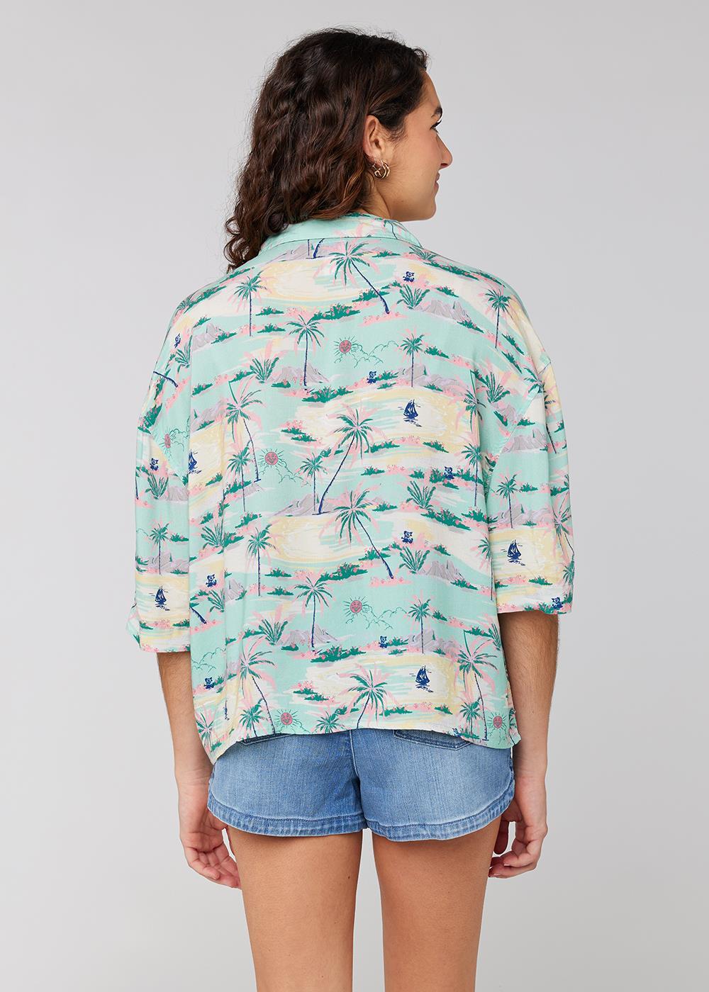 Sisstrevolution Honolulu Shirt in Light Jade with tropical print, back view.