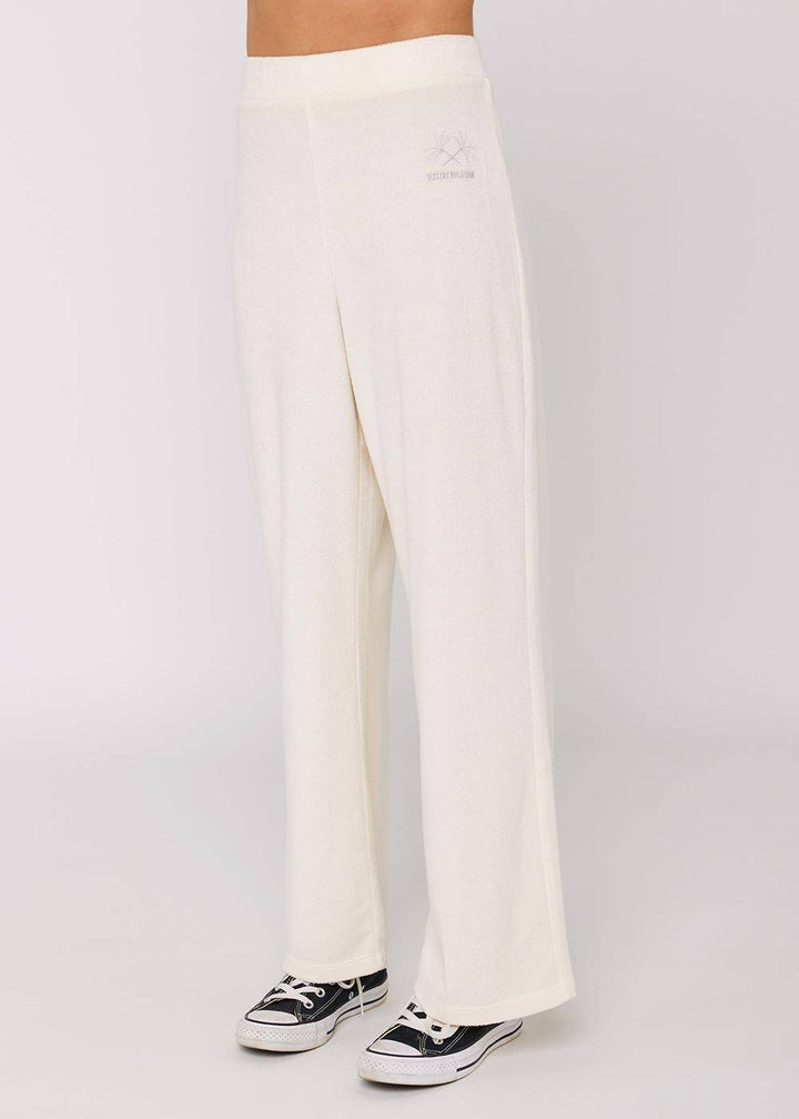 Sisstrevolution Sofia Pant in Sea Salt, side view of relaxed-fit white trousers.