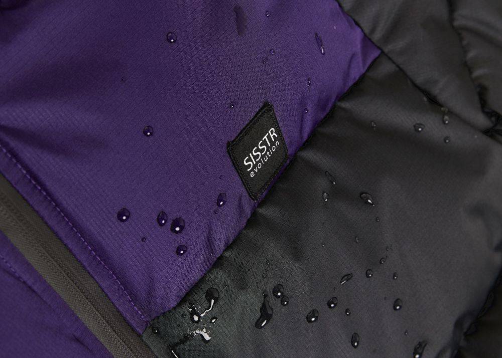 Close-up of Sisstrevolution Rita Puff Jacket showing water-resistant fabric.